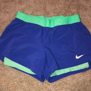 NIKE DRI-FIT WOMEN’S SPANDEX/RUNNING SHORTS